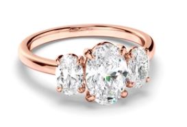 Oval Cut Diamond Trilogy Engagement Ring