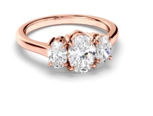 Oval Cut Diamond Trilogy Engagement Ring