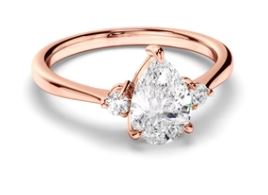 Pear Cut Diamond Trilogy Engagement Ring with Round Brilliant Sides