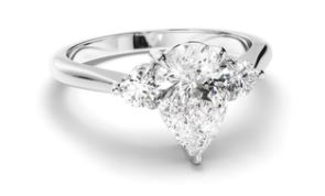Pear Cut Diamond Trilogy Engagement Ring with Round Brilliant Sides