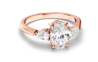 Oval Cut Diamond Trilogy Engagement Ring with Pear Sides
