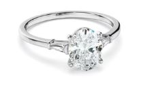 Oval Cut Diamond Engagement Ring With Baguette Sides