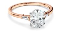 Oval Cut Diamond Engagement Ring With Baguette Sides