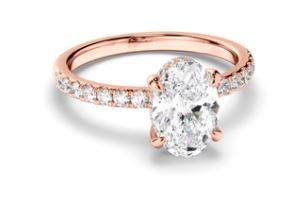 Oval Cut Diamond Engagement Ring with Diamond Sides