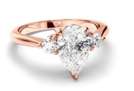 Pear Cut Diamond Trilogy Engagement Ring with Round Brilliant Sides