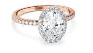 Oval Cut Diamond Halo Engagement Ring With Pave Band