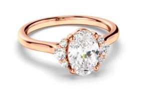 Oval Cut Diamond Engagement Ring with Diamond Cluster Sides