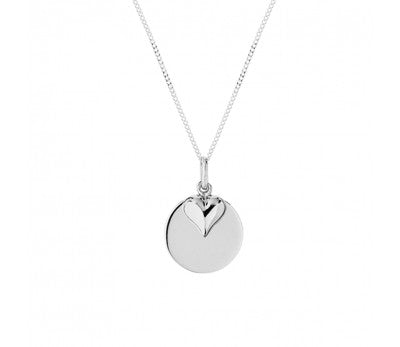 Sterling silver necklace with flat disc and floating puff heart